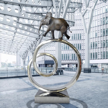 African Elephant Goes Round A Big World (Bronze Sculpture)