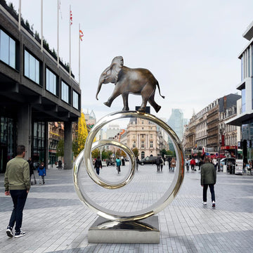 African Elephant Goes Round A Big World (Bronze Sculpture)