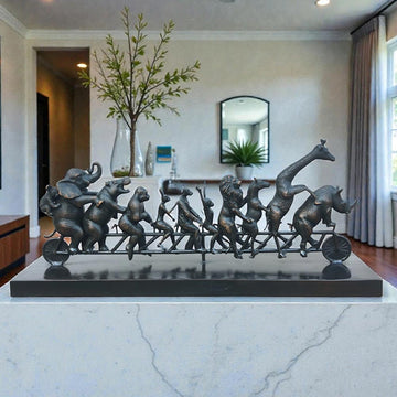 Dogman with Rabbitwoman on a the Biggest Ride of All (Bronze Sculpture)