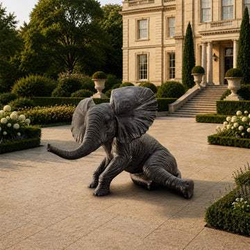 Relaxing Babar the Elephant (Bronze Sculpture, Mid-Size)