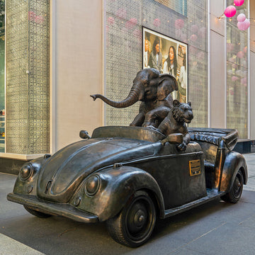 The Bengal Tiger and Sumatran Elephant Race in the Beatle (Bronze Sculpture)