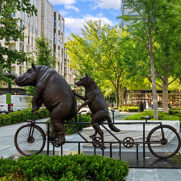 The Hippo and Red Wolf Race on the Bicycle (Bronze Sculpture)
