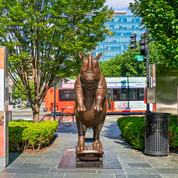The Northern White Rhino Races on the Skateboard (Bronze Sculpture)