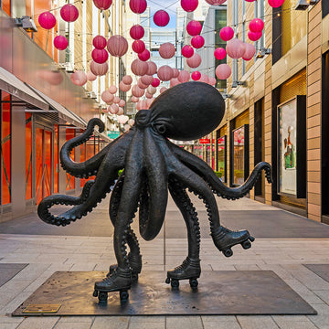 The Octopus Races on Rollers Skates (Bronze Sculpture)