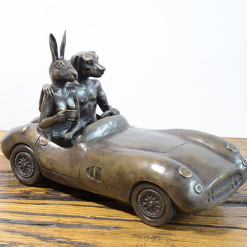 He Was Driving the Most Expensive Car in the World, and He Knew It (Bronze Sculpture)