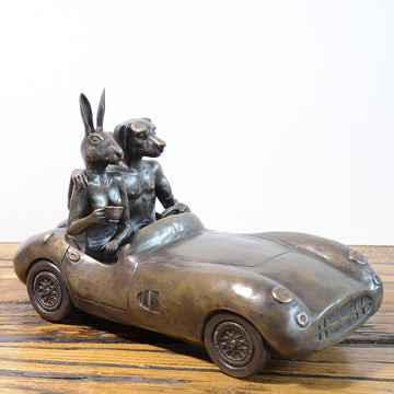 He Was Driving the Most Expensive Car in the World, and He Knew It (Bronze Sculpture)