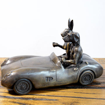 He Was Driving the Most Expensive Car in the World, and He Knew It (Bronze Sculpture)