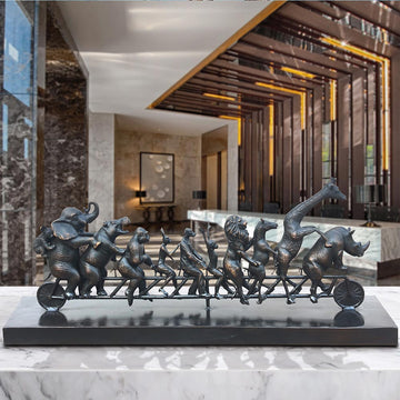 Dogman with Rabbitwoman on a the Biggest Ride of All (Bronze Sculpture)