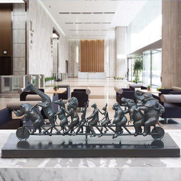 Dogman with Rabbitwoman on a the Biggest Ride of All (Bronze Sculpture)