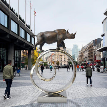 Black Rhino Goes Round A Big World (Bronze Sculpture)