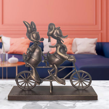 Daisy and Donald Take Love for a Spin (Resin Sculpture)