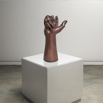 An Elephant up High in a Hand (Bronze Sculpture)