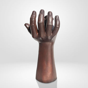 An Elephant up High in a Hand (Bronze Sculpture)