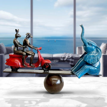 Elephant on a Seesaw with a Vespa (Bronze Sculpture)