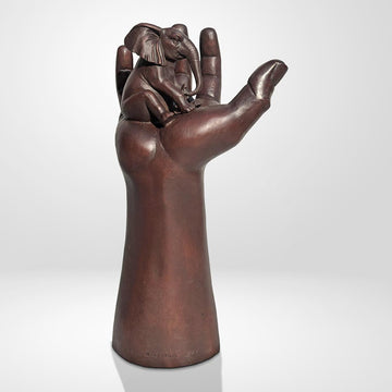 An Elephant up High in a Hand (Bronze Sculpture)