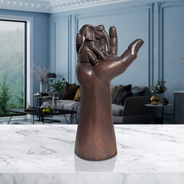 An Elephant up High in a Hand (Bronze Sculpture)