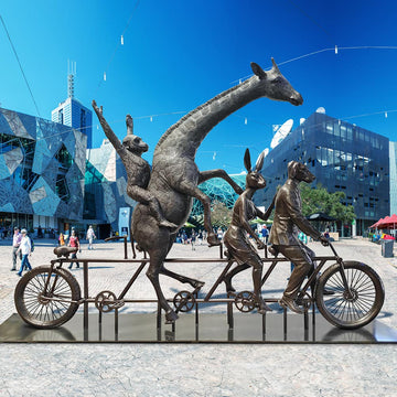 The Giraffe and Chimpanzee Were on a Wild Ride to a Safer Place with Rabbitwoman and Dogman (Bronze Sculpture)