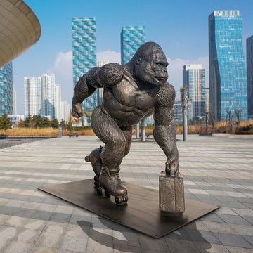 The Mountain Gorilla Races on Rollar Skates (Bronze Sculpture)