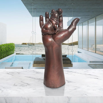 A Hippo up High in a Hand (Bronze Sculpture)