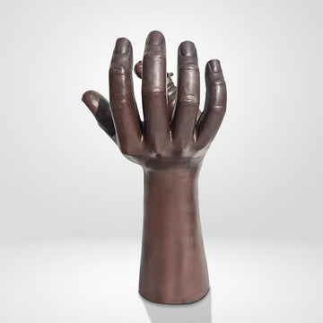 A Hippo up High in a Hand (Bronze Sculpture)