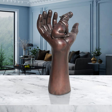 A Hippo up High in a Hand (Bronze Sculpture)