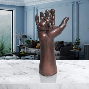 A Hippo up High in a Hand (Bronze Sculpture)