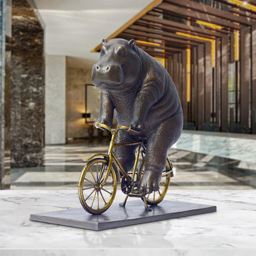 The Hippo Races Against Time on the Bicycle (Bronze Sculpture, Small)