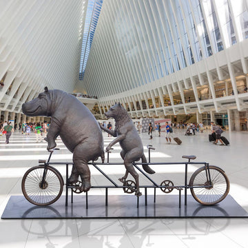 The Hippo and Red Wolf Race on the Bicycle (Bronze Sculpture)