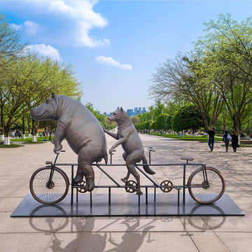 The Hippo and Red Wolf Race on the Bicycle (Bronze Sculpture)