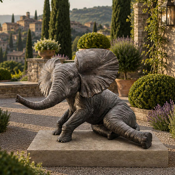 Relaxing Babar the Elephant (Bronze Sculpture, Mid-Size)