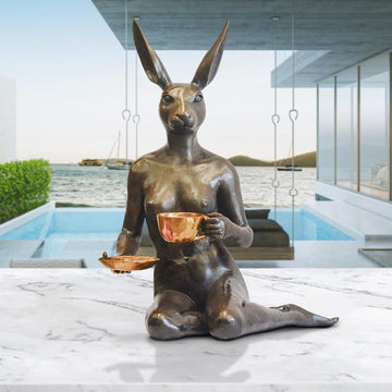 She looked into his eyes as she drank her cappuccino (Bronze Sculpture)