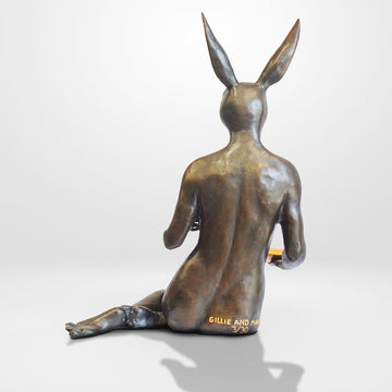 She looked into his eyes as she drank her cappuccino (Bronze Sculpture)