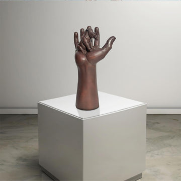 A Rhino up High in a Hand (Bronze Sculpture)