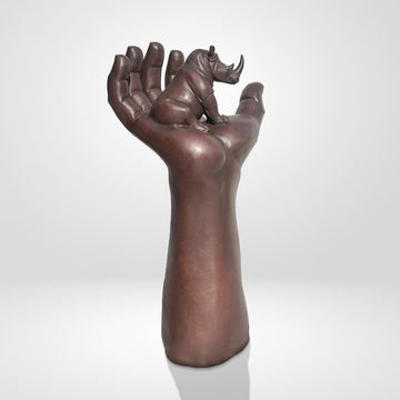 A Rhino up High in a Hand (Bronze Sculpture)