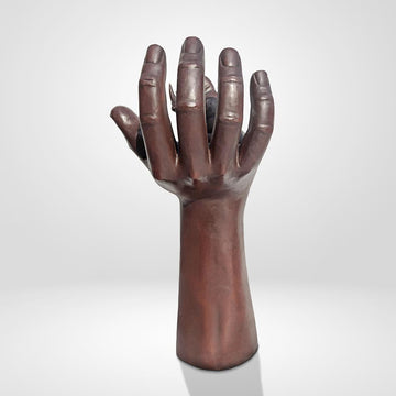 A Rhino up High in a Hand (Bronze Sculpture)