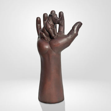 A Rhino up High in a Hand (Bronze Sculpture)