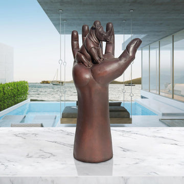 A Rhino up High in a Hand (Bronze Sculpture)