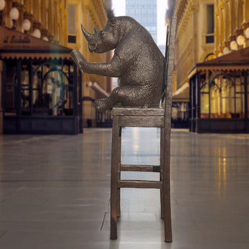 Rhino Above It All, Lost in a Good Story (Bronze Sculpture, Mid-Size)