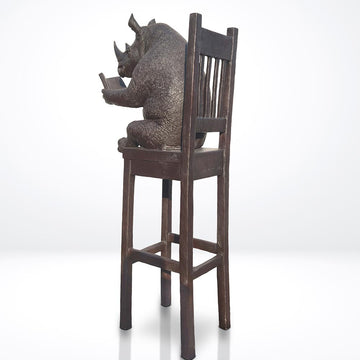 Rhino Above It All, Lost in a Good Story (Bronze Sculpture, Mid-Size)