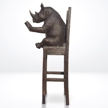 Rhino Above It All, Lost in a Good Story (Bronze Sculpture, Mid-Size)