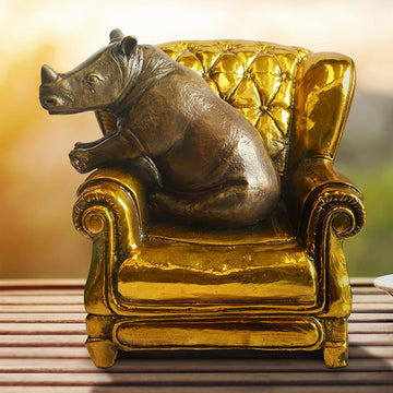 Rhino Me Time on a Chair (Bronze Sculpture, Miniature Collection)