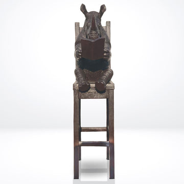Rhino Above It All, Lost in a Good Story (Bronze Sculpture, Mid-Size)