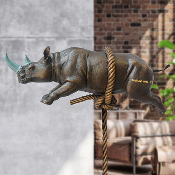 Flying Rhino on Long Rope with a Teal Horn (Bronze Sculpture)