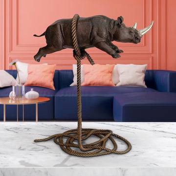 Flying Rhino on Short Rope with a Silver Horn (Bronze Sculpture)