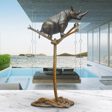 Rhino on a Tree Rope (Bronze Sculpture)