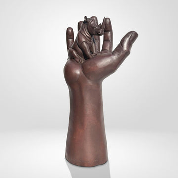 A Rhino up High in a Hand (Bronze Sculpture)