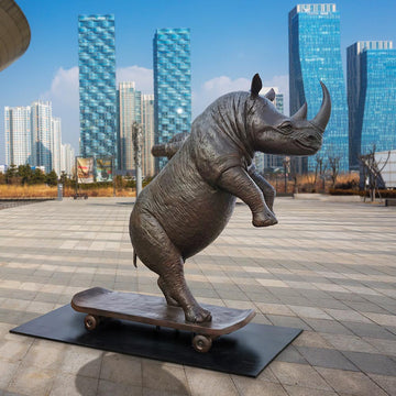 The Northern White Rhino Races on the Skateboard (Bronze Sculpture)