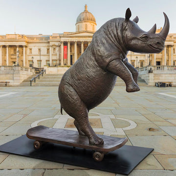 The Northern White Rhino Races on the Skateboard (Bronze Sculpture)