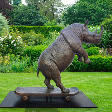 The Northern White Rhino Races on the Skateboard (Bronze Sculpture)