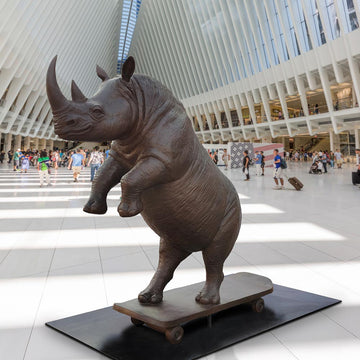 The Northern White Rhino Races on the Skateboard (Bronze Sculpture)